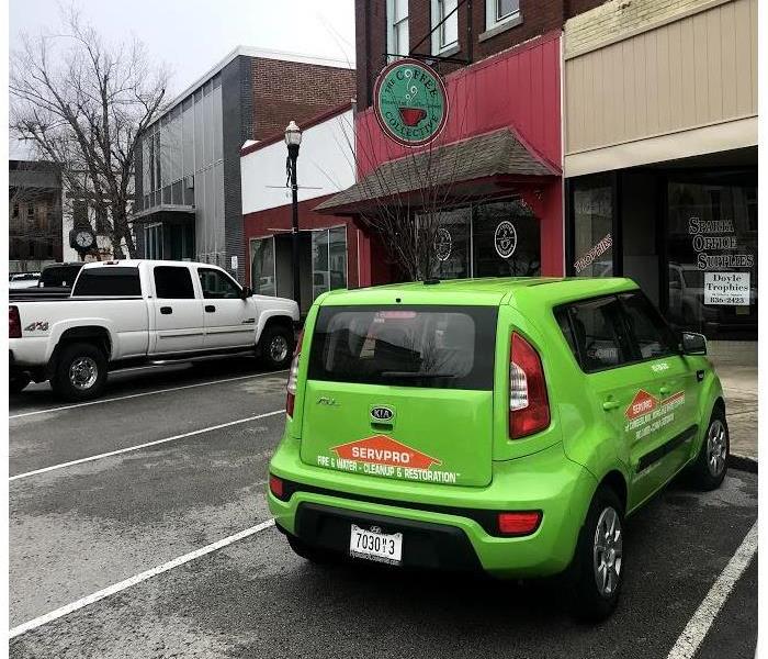 servpro vehicle parked at a retail shop
