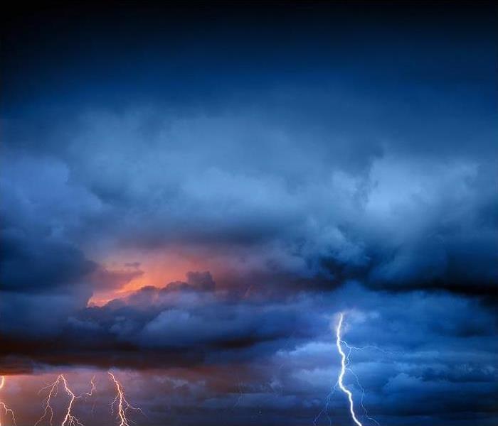 Storm clouds; lightning in clouds